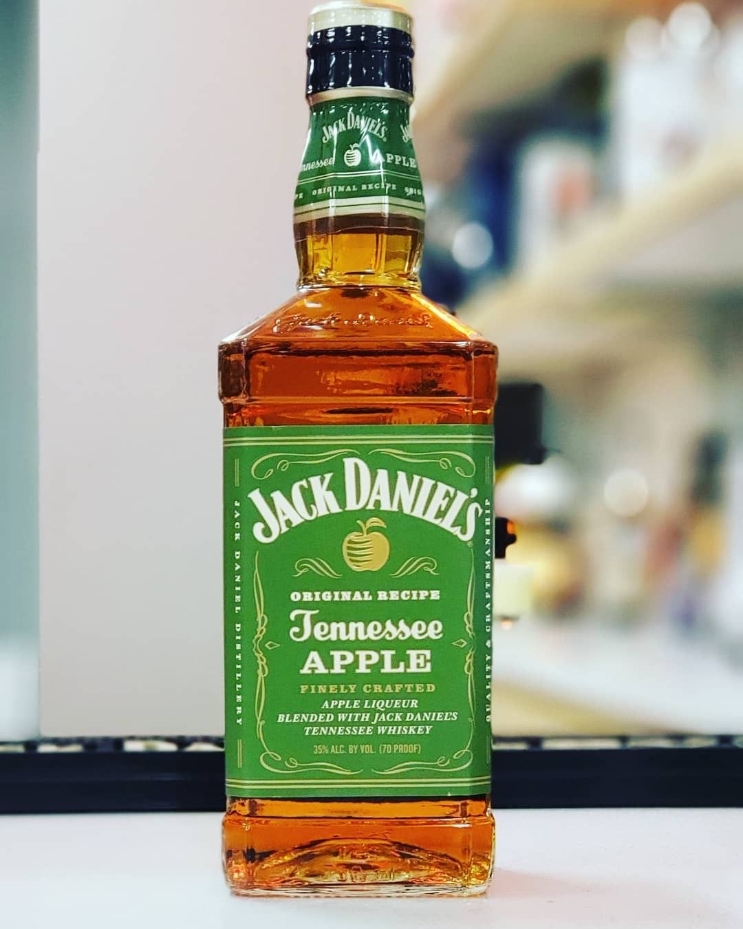 Jack Daniels, Tennessee Apple whiskey.