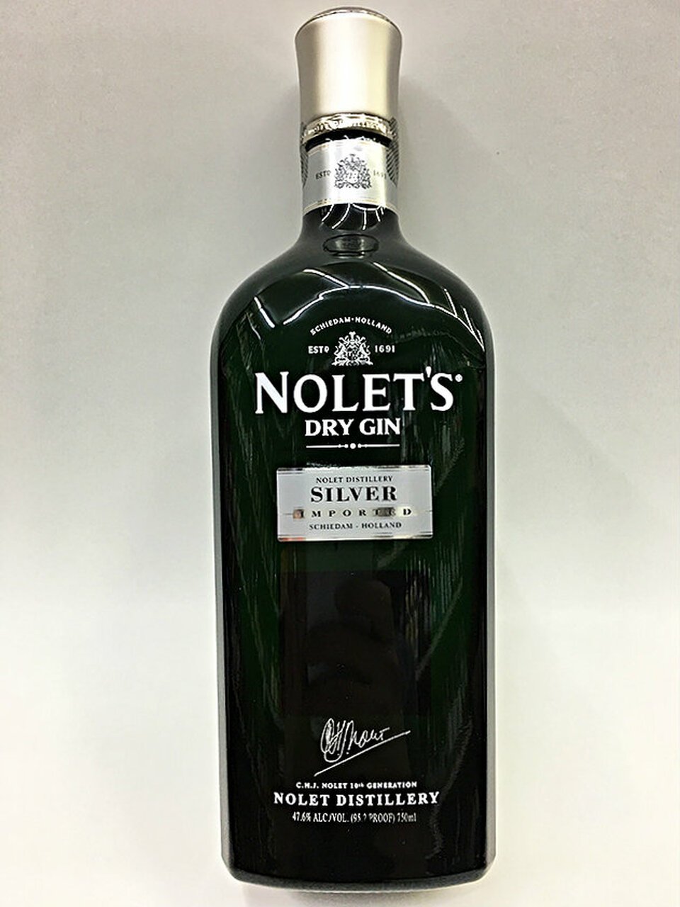 Джин 100 100. Nolets Dry Gin. Nolet Silver Gin. Дорогие Джины алкоголь. Джин бутылка.