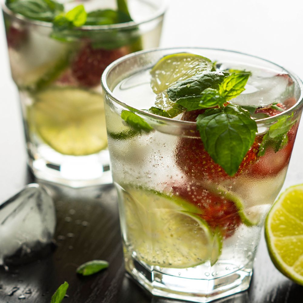 Strawberry Lemonade Mojito Recipe with Rum, Lemon Wedges &  Mint Leaves ...